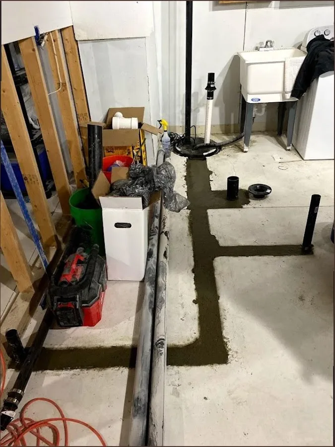 Plumber preparing for a repair during an emergency