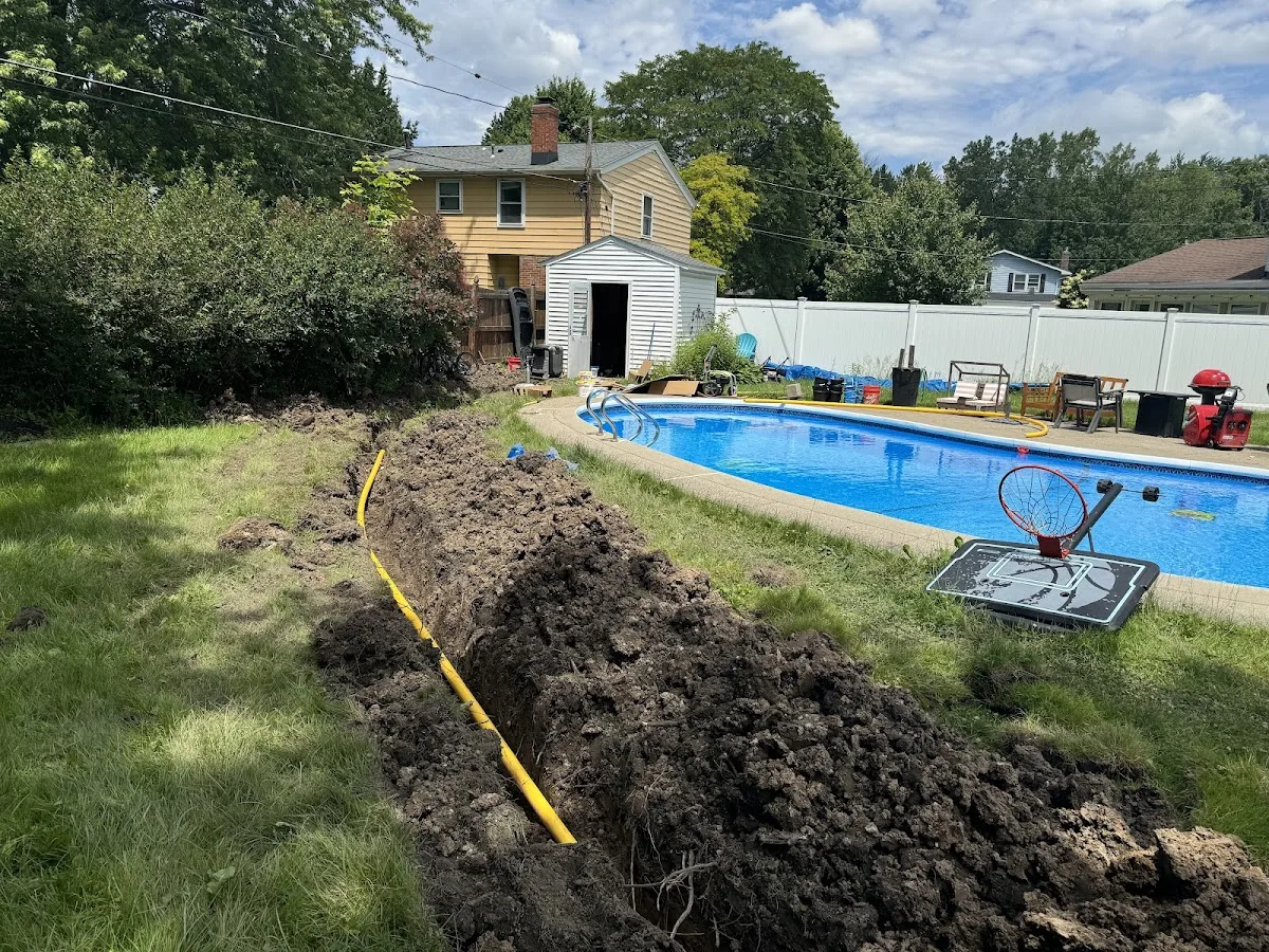 Technician working on drain systems